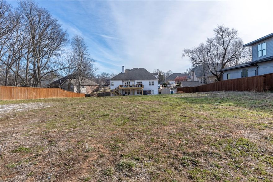 Seize the chance to build your dream home in this highly desirable new subdivision in Bentonville! Cleared and ready to build, quiet street ending in a cul-de-sac. Conveniently located by popular Coler Mountain Bike Preserve trails, Downtown Bentonville, Schools, Business etc.!  10 mins from Walmart’s New Campus! Several homes already built in this 15-lot development. Min. 3,000 sqft build out. Utilities at the street.