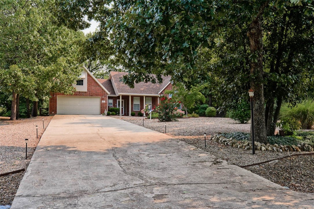 This is just what you have been waiting for!2 FLAT LOTS! 1 has lovely 3 Bdr, 3 Full Bath home, could easily be 4 bed. the indent for closet is already in office/den all you need are doors! Flat yard, Flat driveway! Kitchen newly redone, Brand new HVAC 2/2021 Roof is 5 yrs. 3 sides brick. Home is very soundproof and energy efficient. Tons of storage in this home. Every inch was used. Lovely window treatments convey. Freshly painted rooms, Hardwood floors for easy care. Patio is huge, (47') with a portion partially covered and faces East so evenings are great for relaxing and watching the deer and wildlife from your deck. Under counter led lighting, led lighting throughout most of home, storage galore! Cathedral ceiling in Great room, sink in laundry rm. This home has it all, and move-in ready! refrig, washer and dryer convey. Don't let this one get away! Add'l lot is wooded and flat great for privacy and ?