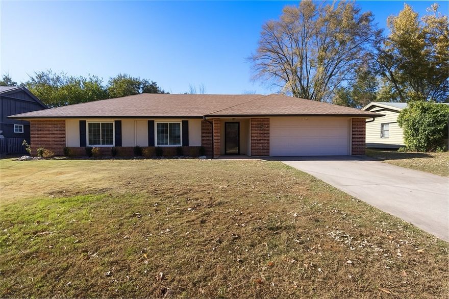 This updated brick home puts you right in the heart of Bentonville—just moments from Osage Park, Downtown, the Momentary, and Walmart Home Office. Inside, you’ll find bright neutral paint, wood-look flooring, and an inviting kitchen with white cabinets, butcher-block counters, a subway tile backsplash, and stainless appliances. Bedrooms are well-sized, and both bathrooms have tasteful updates. Add in the whole-home water filtration system, a spacious fenced backyard, and an attached two-car garage, and you’ve got a comfortable, move-in-ready home in a location that’s hard to beat.