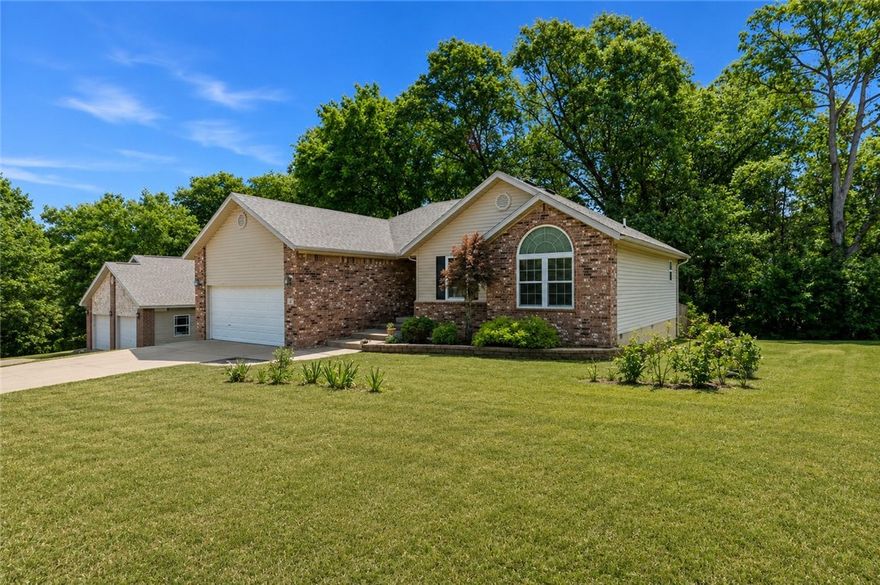 This charming 3-bedroom, 2-bath home sits on a desirable corner lot just minutes from schools, shopping, and bike trails. Designed for easy one-level living, the home features granite countertops, a ventless propane fireplace with logs, and hardwood flooring in the living room and hallway. The accommodating kitchen includes stainless steel appliances and plenty of workspace. Step outside to a covered deck overlooking a fully fenced backyard—perfect for relaxing or gathering around the fire pit. The two-car garage has been converted into a versatile bonus room (not included in square footage), offering extra flexibility for hobbies, workouts, or storage. Space in the crawlspace for a workshop. Additional highlights include a newer roof & paint, sewer conversion, appliances and home warranty convey. Clean, comfortable, and full of charm, this home is ready for its next owners!