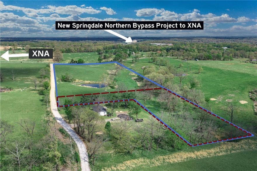 Just 2 miles from XNA Airport, this 2.25-acre parcel sits at the southwest corner of Hendrix and Reams Road in Gentry, offering paved road frontage. Please note: a lot split is currently in progress on the larger 12.4-acre tract, which is also available to purchase as a whole. This listing is specifically for the L-shaped lot as identified in the attached survey and shown in the listing photos. The land is cleared and gently rolling, with electric, gas, and public water at the street — and the property has already perked for septic. Whether you're building your dream home or an investment property, this is a turnkey-ready lot in one of NW Arkansas's fastest-growing corridors. Refer to survey for exact boundaries.