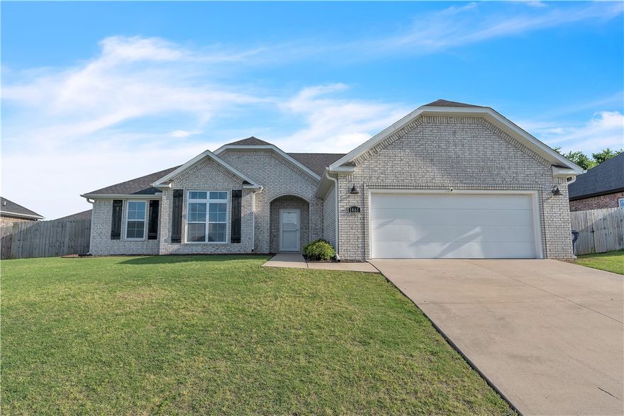 Spacious and well-maintained home with stylish modern touches! Warm wood flow throughout every room in this split floor plan. The layout offers privacy with bedrooms on opposite sides of the home, which the central living space is bright and open- perfect for everyday living and entertaining. All closets offer generous storage, and the pantry is a standout feature! Step outside to enjoy the added perk of a newly built deck in the backyard, ideal for relaxing or hosting guests. Located in Prairie Grove, you'll enjoy convenient access to a water park, state park, shopping, restaurants, and a charming historic downtown filled with flea markets and antique malls.