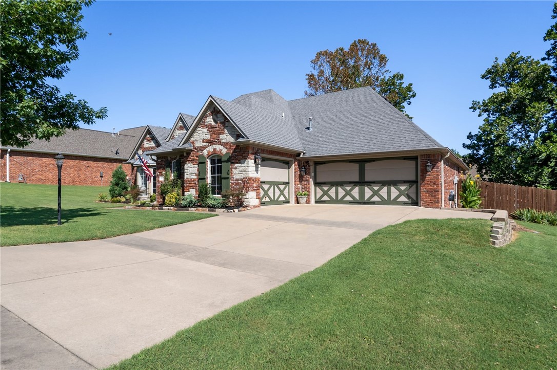 An absolute stunner in one of the most sought after subdivisions in Van Buren, Park Ridge at Lee Creek. Fall in love immediately with the landscaping and gorgeous exterior on this fully remodeled home. Open your new front door and you're immediately greeted with luxury vinyl plank flooring throughout the living areas and plantation shutters on every window. An immediate left takes you to your dining room with a wood lined ceiling and bay window with plantation shutters. A convenient guest bath off front before you move to the spectacular kitchen featuring a huge granite island, coffee bar in the nook, lots of modern white cabinets, stainless appliances and tons of granite. Livingroom has wall of windows beaming natural light and fireplace. Primary with cool ceiling and ensuite with his and hers walk-in-closets, dual vanities, shower and jacuzzi. 3 more good sized bedrooms, bathroom and laundry on opposite side. Outside find a beautifully manicured, tiered, fenced yard and an outdoor fireplace for cool family nights
