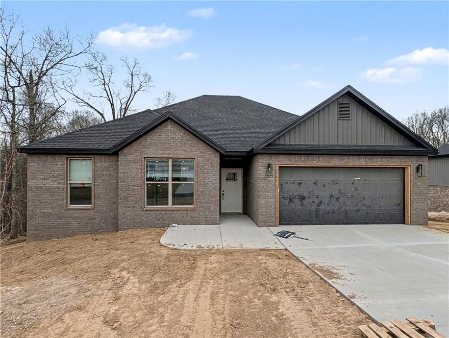 Welcome To Your Next Home! This Brand-New Build Is So Fresh It’s Basically Still In The Oven—And You Still Get To Pick The Toppings! Rates As Low As 4.875%, Giving Your Wallet A Huge High-Five. This 3-Bedroom Beauty Rocks A Split Floorplan And 9-Foot Ceilings That Make You Feel Like A Giant (In A Cool Way). The Vaulted Living Room Is A Total Showstopper— With Beam Treatment For The "Wow" Factor.
The Kitchen Is A Chef’s Playground With Custom Cabinets, Quartz/Granite Counters, And An Island Ready For Your Best Charcuterie Board. The Primary Suite Is Pure Luxury With A Tile Shower And A Closet So Clever It Connects Directly To The Laundry Room. Yes, You Can Go From "I Have Nothing To Wear" To "Freshly Dried Socks" In Three Seconds Flat. Every Inch Is Designed For Real Life, Not Just Staging. Outside, Your Covered Deck Overlooks A Soon-To-Be-Sodded Yard With Peaceful Views Perfect For Morning Coffee Or Evening Chill. It’s Stylish, Functional, And Waiting For Your Magic Touch. Don't Just Dream It—Move In And Live It!