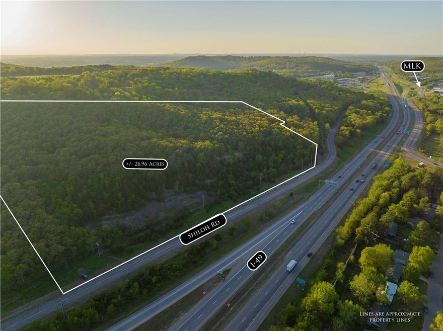 Welcome to an unparalleled opportunity for commercial development or any venture of your choosing! This pristine 26.96-acre parcel of wooded land, nestled in the heart of Fayetteville, is a developer's dream come true. Situated just off I-49, this prime location offers unrivaled visibility and accessibility, making it an ideal spot for businesses seeking maximum exposure. Strategically positioned near the U of A, this property promises a steady stream of potential customers & endless possibilities.