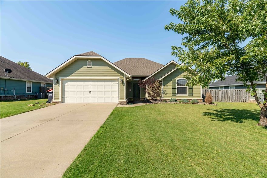 Beautiful Craftsman home in Grand Valley Subdivision! Ideally located within walking distance to the Lakeside Junior High, just minutes from Don Tyson Parkway, and adjacent to CL "Charlie" and Willie George Park

Homes feature modern upgrades including granite countertops, 2" faux wood blinds, stainless steel appliances, 10' ceilings, and a relaxing whirlpool tub. Enjoy a covered patio, wood privacy fence, gutters, and a cozy gas-log fireplace. Community amenities include a playground, making this the perfect neighborhood for comfort and convenience.
