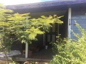 Lot in Denning community just outside of Altus. Home is in bad shape, would be a good location for a new home.