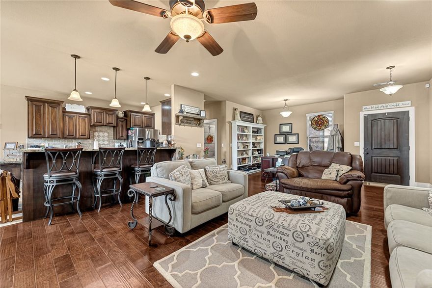 Stunning European-Style Home in Prime Rogers Location! Welcome to this beautifully custom-built 3-bedroom, 2-bath home offering 2,074 sq ft of elegant living space—all on one level! Located in the heart of Rogers, you're just minutes from everything: Walmart AMP, Top Golf, restaurants, shopping, and more. This home features a spacious open floor plan designed for comfort and entertaining. Enjoy two covered porches and a generous backyard, perfect for relaxing or hosting gatherings. Inside, you'll find wide doorways, two walk-in showers, and thoughtful touches throughout, offering both accessibility and style. The European-inspired exterior showcases custom rock and stone detailing, adding to the home’s exceptional curb appeal. Built in 2014, this home also includes a rare 3-car garage, providing ample storage and space for hobbies or toys. No POA! Don’t miss the chance to own this one-of-a-kind property in a highly desirable location.