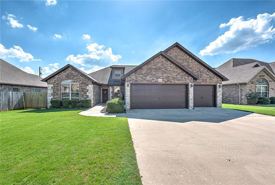 Stunning European-Style Home in Prime Rogers Location! Welcome to this beautifully custom-built 3-bedroom, 2-bath home offering 2,074 sq ft of elegant living space—all on one level! Located in the heart of Rogers, you're just minutes from everything: Walmart AMP, Top Golf, restaurants, shopping, and more. This home features a spacious open floor plan designed for comfort and entertaining. Enjoy two covered porches and a generous backyard, perfect for relaxing or hosting gatherings. Inside, you'll find wide doorways, two walk-in showers, and thoughtful touches throughout, offering both accessibility and style. The European-inspired exterior showcases custom rock and stone detailing, adding to the home’s exceptional curb appeal. Built in 2014, this home also includes a rare 3-car garage, providing ample storage and space for hobbies or toys. No POA! Don’t miss the chance to own this one-of-a-kind property in a highly desirable location.