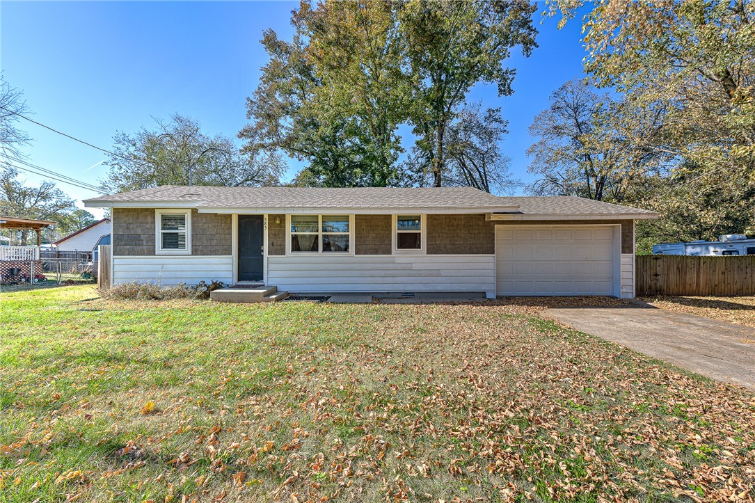 Welcome home to this 3 bedroom 2 bath in the heart of Pea Ridge! Ceramic tile wood floors, carpeted bedrooms, beautifully tiled showers, granite countertops, and stainless appliances. New washer and dryer convey.