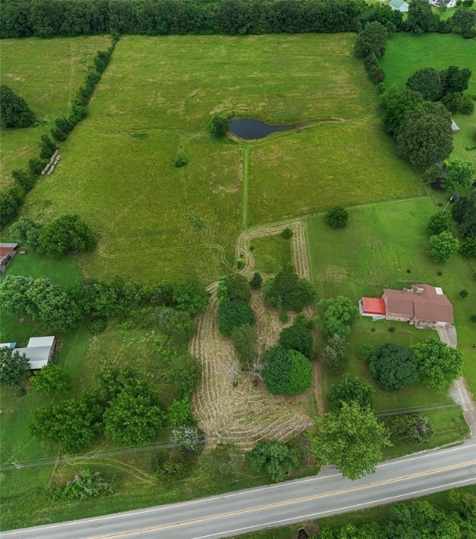 This 5 acre tract with highway 7 frontage is waiting for someone wanting to build! 1,000 gallon septic is currently on the property and has been pumped. Located close to both Harrison and the Buffalo National River. The back of the property is rolling pasture land and could be a good place for some livestock or possibly multiple homes. Act quickly.