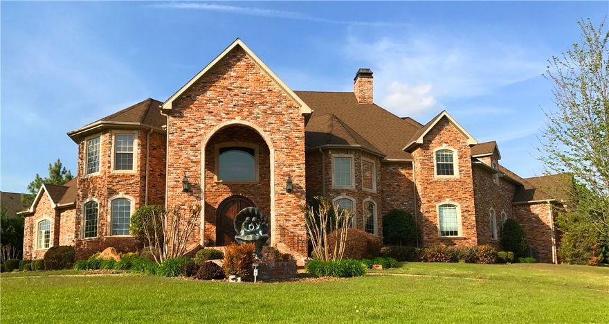 Immaculate luxurious executive home on large corner lot filled w/ space for your family. Custom movie theater, game room, exercise room, in-ground pool, grill station. Amazing architectural construction features huge vaulted ceilings accented by crown molding even in the closets! Barrelled ceilings in master suite. Open kitchen w/large living spaces. Gorgeous flooring w/ marble & ceramic tile. Awesome layout for entertaining & private back yard. Zoned heat/air. This home has it all, quality construction.