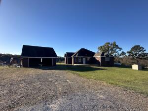 Sold outside of MLS. This turnkey breeder egg farm spans 74 acres and offers low operating costs with a reliable income through a Tyson Hatchery contract. 70 acres of fenced and cross-fenced pasture, ideal for cattle. Horsehead Creek runs along the southern boundary, enhancing the property's natural appeal. Two 40x470 breeder houses, built in 1997 and 2001, come fully equipped with cool cells, ventilation fans, and a diesel backup generator. The 1,887 sq. ft., 3-bedroom, 2-bath home boasts a formal dining room, a spacious living room and master bedroom. Start your dream farm today!