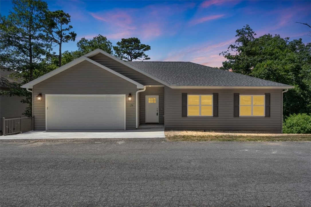 Brand New & Beautiful - Tucked into the trees yet just minutes from everything, this new construction home offers the best of Bella Vista living—peaceful, modern, and move-in ready.
Step inside to find luxury vinyl flooring, quartz countertops, and an open, light-filled layout designed for comfort and style. The spacious deck invites you to relax or entertain while surrounded by nature.
Love the outdoors? You’re just 5 minutes from the Back 40 trailhead and Highway 71, and less than 10 minutes to Bella Vista Country Club for golf, dining, and community fun.
Whether you're settling in full-time or seeking a weekend retreat, 28 Fleetwood brings you home to the Ozarks—fresh, private, and perfectly located.