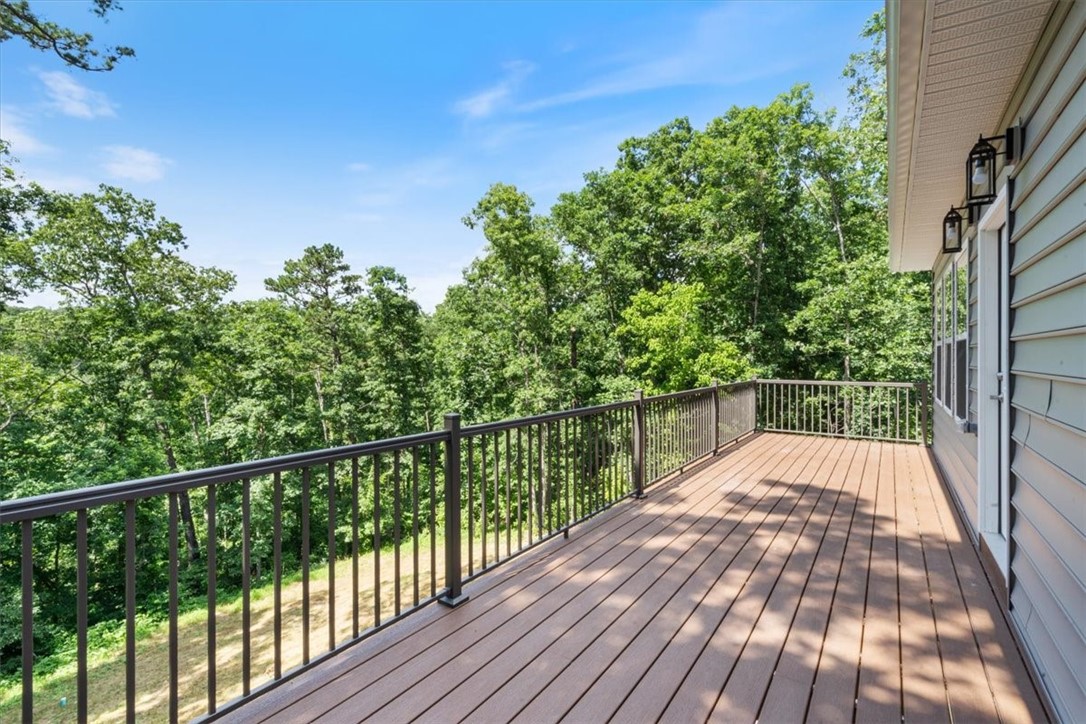 Brand New & Beautiful - Tucked into the trees yet just minutes from everything, this new construction home offers the best of Bella Vista living—peaceful, modern, and move-in ready.
Step inside to find luxury vinyl flooring, quartz countertops, and an open, light-filled layout designed for comfort and style. The spacious deck invites you to relax or entertain while surrounded by nature.
Love the outdoors? You’re just 5 minutes from the Back 40 trailhead and Highway 71, and less than 10 minutes to Bella Vista Country Club for golf, dining, and community fun.
Whether you're settling in full-time or seeking a weekend retreat, 28 Fleetwood brings you home to the Ozarks—fresh, private, and perfectly located.