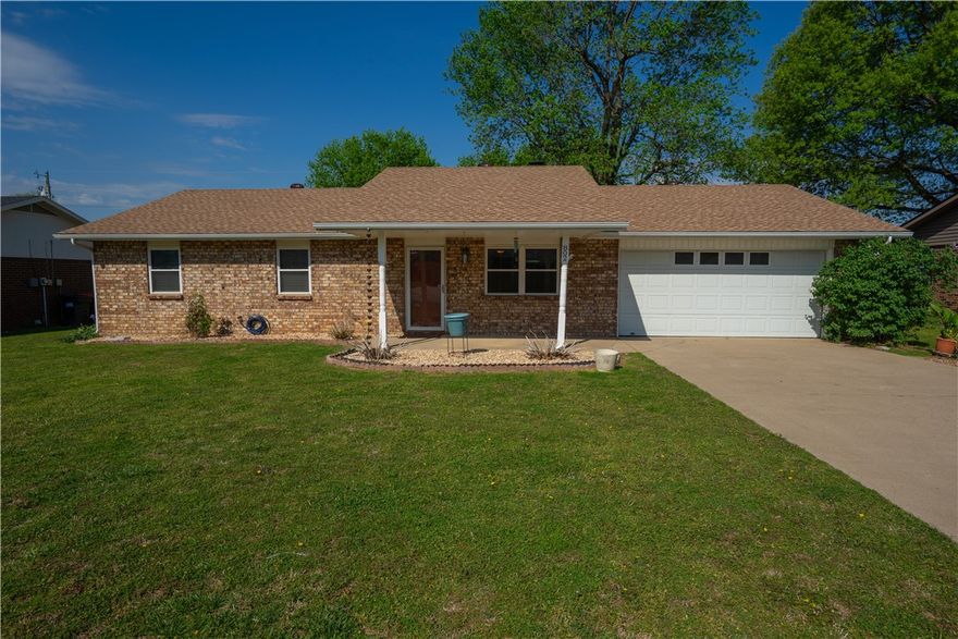 Welcome home to this well maintained home in a convenient location. Ideally located just minutes from I-49, you’ll enjoy an easy commute to all areas of Northwest Arkansas while still appreciating the peace and quiet of this charming setting. Step inside to discover large, light-filled living spaces that create a warm and inviting atmosphere throughout. Thoughtful updates by the seller, including beautifully renovated bathrooms with warranty as well as a new roof with warranty that make this home truly move-in ready. Out back, unwind on the inviting screened-in porch—perfect for enjoying your morning coffee or relaxing in the evening while overlooking the beautifully landscaped yard and mature trees. The spacious backyard offers privacy fencing and a double gate, providing both seclusion and convenience. With its quiet surroundings, close proximity to schools and medical facilities, and exceptional care throughout, this home is a true standout you won’t want to miss!