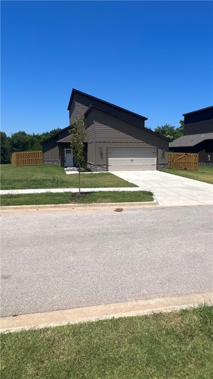 New construction Modern style home with large yard and no buildings behind you(wildlife conservation)! This 3,2.5,2 is a must see. Main level you will find your living room, kitchen, dinning, master bedroom, laundry room and guest bathroom. Upstairs is your additional 2 beds and full bath with a covered balcony to over look the wildlife conservation! Nice large fenced backyard for lots of room to play. Inside you have custom built cabinets, granite counter tops, walk in closets, wood look tile and carpet in the bedrooms. Close to the univeristy of Arkansas and easy access for I-49! Agent related to seller Seller offering upto $12,000 in concessions preferred lender offering upto $3500 credit