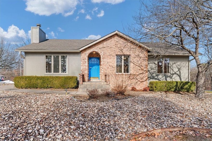 Nestled in the heart of adventure, 2 Wreay Lane is a meticulously maintained gem. This 1,490 sq. ft. home remains largely in its original, pristine condition, offering a rare blend of vintage charm and impeccable care. Situated in the highly-rated Bentonville School District, this property is a sanctuary for outdoor enthusiasts. You are minutes from world-class recreation, including the stunning Tanyard Creek Nature Trail and the legendary Back 40 trails. The highlight? Unmatched proximity to the groundbreaking OZ Trails Bike Park, Arkansas’ first chairlift-served mountain bike destination. Imagine being just a short distance from 20 miles of gravity trails, a high-speed quad lift, and a vibrant community hub with dining and art installations. Experience the tranquility of the Ozark woods with the excitement of the "Mountain Biking Capital of the World" at your doorstep.