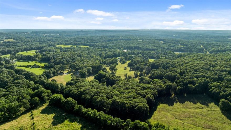 Endless Possibilities on 39+ Acres in Northwest Arkansas!
Discover the beauty and potential of this 39.1 acre property that backs up to the Devil’s Eyebrow Natural Area a breathtaking stretch of protected Arkansas land known for its scenic views, wildlife, and outdoor recreation. Whether you're dreaming of a peaceful homestead, hobby farm, or hunting retreat, this versatile land delivers.
Property features a 1,800 sq ft manufactured home. The true highlight is the land itself: a mix of open pasture and mature woods, featuring enormous dogwood trees, rich wildlife presence, and endless room to roam. A large 4 bay workshop/garage provides plenty of space for equipment, storage, or hobby use.