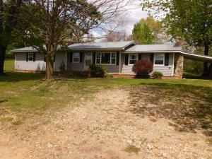 A lot of house at a low price! 3BR, 2BA home just off pavement. Living room, large family room w/wood burning fireplace. Kitchen/dining combo w/lots of cabinets offering sealed wood countertops and newer appliances. Master suite w/walk in closet and access to patio. New roof. Seller states both Alpena and Green Forest buses run by the house so you can choose - check with schools.