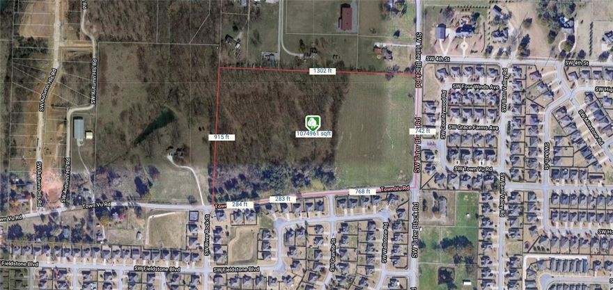 Do not miss out on this development opportunity. Major Road Frontage. 25 Acres more or less. House on lot has no value and needs to be removed. 1335 ft town vu frontage and 742 ft tater black frontage.
