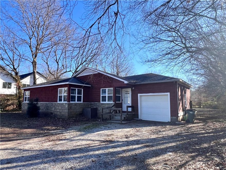 Spacious 2 bedroom, 1 bath home with Large yard minutes from the U of A. This property is located close to shopping, food, access to I-49, and Bike trails within 2 miles from the house in all directions.