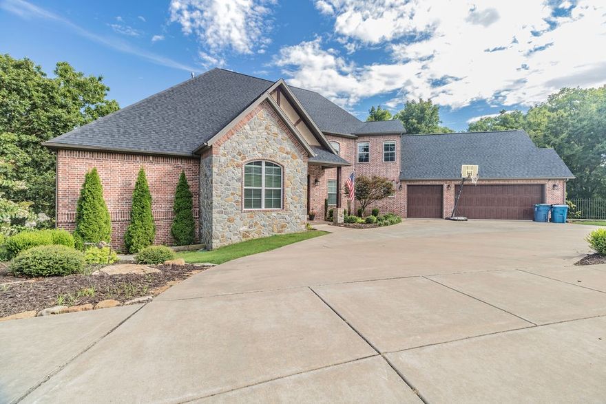 One owner, custom home in the heart of Bentonville sitting on a .6 acre lot. Three levels with so much natural light. Main level features an open kitchen and living, half bath, one Master suite with huge his and her closets, and an office/study with a gas fireplace and built-ins. Second level with another master suite plus two more bedrooms, full bath, and a catwalk overlooking downstairs living. In the walk-out basement you'll find a large bonus space with a kitchenette, two bedrooms, a full bath, and a tiled pet room! Tons of deck space, large screened in area with private master suite access. And don't forget that heated salt water pool with a slide and hoop to keep everyone entertained. So much to love inside and out. Instant equity! Property appraised for over $1M in February 2021. Additional 5.98 acre adjacent lot also available. See the full photo album at https://realestatephotonwa.pixieset.com/1306bluffsprings/