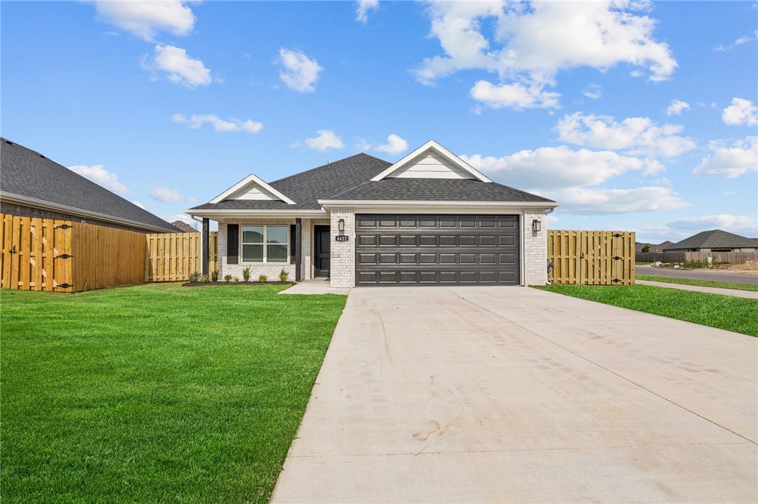 Welcome to the Ashton, a charming one-story ranch style home designed to bring comfort to your daily living. This floor plan is 1,496 sq ft and has 3 bedrooms, 2 bathrooms, and a finished 2 car garage with many customization options to meet the needs of you and your family. After walking into your home from the covered front porch, a beautiful entry hallway runs past your dining area and kitchen into the high-ceiling living room, creating a sense of privacy between your common space and entryway. The Ashton is the only cottage style home to boast ten foot ceilings in the living room, giving it a sense of luxury and breathability ideal for hosting any number of occasions. This, combined with the spacious covered back patio, make this floor plan perfect for anything from grilling on game day to having a family movie night.