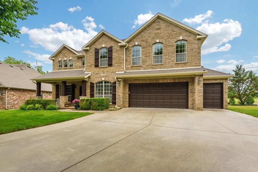 Welcome to 1661 S Coopers Cove in Fayetteville. This 5 bed, 3.5 bath home sits in a gated community directly across from Stonebridge Meadows Golf Club and is only 4 miles to the University of Arkansas. Enjoy views of the golf course from the enclosed back patio & landscaped backyard. Inside, the main floor includes an office and formal dining room & upstairs find a media room and bonus room with wet bar for entertaining. Natural light flows into the centralized living room thru the wall of tall windows. The kitchen is conveniently located & features granite countertops, pantry, gas range & a casual dining space overlooking the backyard. The primary ensuite includes a double vanity, walk in closet, walk in shower & jetted tub. The 4 secondary bedrooms & two full bathrooms are upstairs. The third car garage is the perfect size for a golf cart plus storage for bikes and yard equipment. The exterior of the home has been freshly painted with updated landscaping in the backyard. New flooring 2023. Newer roof.