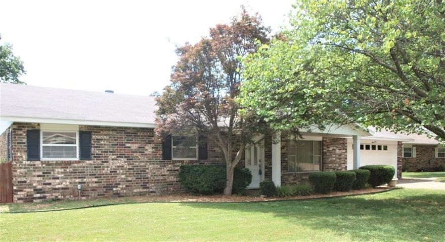 Wonderful! From entering the front door to going into the back yard all you can say about this property is FABULOUS! Large open living area w/dining room & nice kitchen w/lots of cabinets. Laundry room is conveniently located w/nice cabinets for extra storage, 3 large BR w/built-ins & walk in closets, 2 BA, wood floor thru-out, tile in wet areas. New paint, roof less than 5years, hvac 4yrs. All brick exterior & back yard is just waiting for a family to enjoy the in-ground pool. Call today for your showing