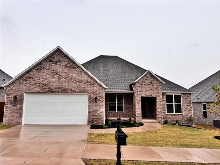 The picturesque Princeton 4 plan in Hughmount, located in Fayetteville, Arkansas! The Princeton 4 plan has 2424 square feet, with 4 bedrooms, 3 baths and a flex space/study.  These brand-new homes boast 4-sided brick and LVP flooring. Fantastic front porch with a sitting area. Upon entrance, there is a flex space / study and a spacious living area featuring a gas fireplace with a poplar mantle. The kitchen will have 42-inch cabinets, lovely appliances and quartz countertops and tile backsplash. The Primary bedroom has a fabulous en suite, dual sinks, with a walk-in shower with tiled walls and a soaking tub!  These homes feature LED lighting throughout, and a high efficiency AC with programmable Wi-Fi thermostat. Come find your dream home today! Taxes and Parcel TBD. Garage Door Opener!