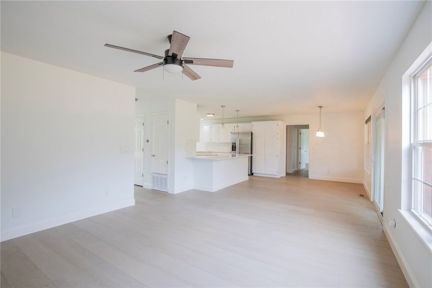 Beautifully remodeled 4-bedroom, 3-bath home with a dedicated office featuring bright, open living spaces and modern finishes. Downstairs includes a bedroom, full bath, and private office. Enjoy the screened-in, covered back patio with dual heaters, large patio space and covered parking. Landlord covers lawn mowing. Located across from Old Tiger Track, steps from Slaughter Pen bike trails, and walking distance to Downtown Bentonville, Crystal Bridges, the Amazeum, and top schools. Ideal for families or professionals seeking style, comfort, and convenience in a prime Bentonville location.