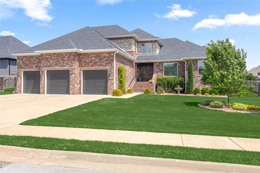 Enjoy all the pleasures of luxury and relaxation in this beautiful custom built home located in the heart of NW Arkansas Tuscany Subdivision less than five miles to I49 and Downtown Bentonville arts and entertainment district! Spend hot summer nights in oversized inground saltwater diving pool enjoying the fully landscaped views! Cool down, grill and entertain under the covered patio, and don't forget the access to outdoor full bathroom! Gather friends in the beautiful eat in kitchen with oversized pantry and island bar! And, there is no lack for storage in the amazing custom cabinets! Home also features primary bedroom with French door access to pool, large ensuite bathroom with deep soaker tub, walk-in shower, walk-around large closet to laundry and mud room. Private home office, formal dining room and upstairs floorplan offers bedroom, large closet, full bath and rec room with web bar. Garage was custom built, plenty of space for big rigs, equipment and storage. You don't want to miss this!