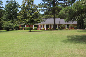 Great time to buy this home in a fantastic neighborhood! The lot is over 1 1/2 acres, and the home features 4 beds/2 baths an attached 2-car garage and many updates! Also included is a large, detached shop with concrete floor and power. Check out the photos and location and you're sure to fall in love!!