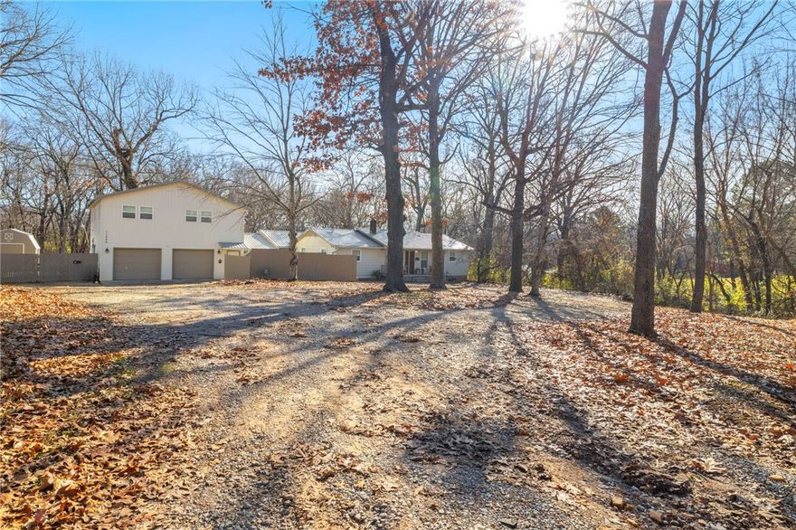 What a great opportunity for live in investment. 4300 sqft with 4 units! 7 beds and 6 baths can easily be converted back to a singular home or keep as multiple units. Completely updated in the last couple of years. Each unit has independent: HVAC, laundry hookups, appliances, Ozark Go fiber, and Cox Cable. Each unit has a deck or porch, there is a storage unit and a functional 2 car garage. Located in between Farmington and Prairie Grove, off Hwy 62 on a private dead end drive. Prairie Grove and Farmington are host to restaurants, shopping, flea markets, a water park, city parks, and 20mins to the University of Arkansas. Please do not disturb tenants, one unit available now for showings. Lease details available. Also listed as Multi family mls 1283138