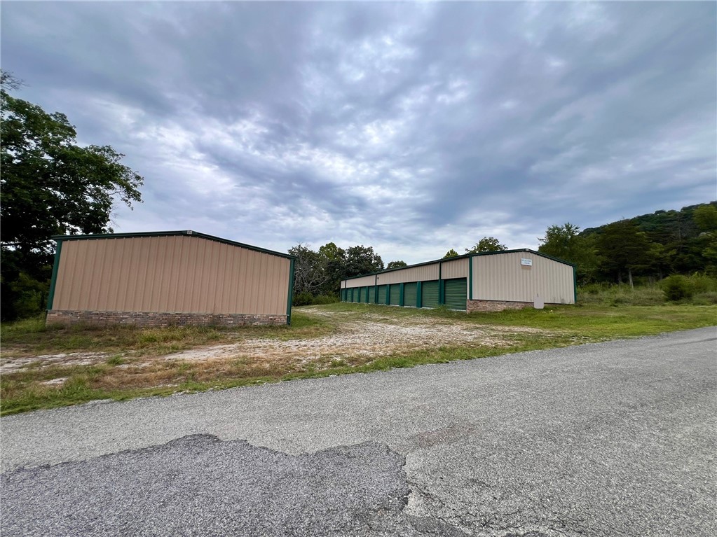 Excellent business opportunity with 33 storage units currently and more space to grow if you wanted to or fence off and have exterior area for storage on the property. There are 26 units that are 10X15, 2 Units that are 14X30, 4 units that are 6X15, and 1 unit that is 10X30 Drive Through. The lot next door can also be purchased with this property.