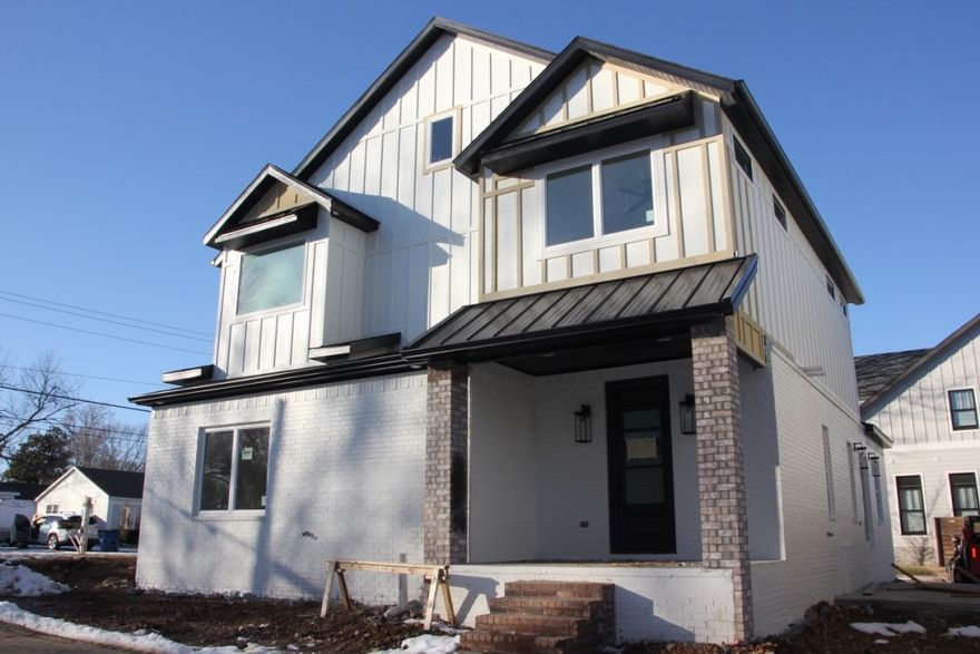 Introducing 113 NW Ozark Way of Oz Village. A downtown Bentonville neighborhood that boasts modern craftsmen style with beautiful, high-end finishes. This is luxury, low-maintenance living just minutes by bike or foot to Oz Trails, Compton Gardens, the square, Crystal Bridges Museum, restaurants, shopping and the heart of Bentonville. This single family home has a private side yard with patio, 4 bedrooms (or 3 plus office), 3 full bathrooms, 2 car attached garage. The community has "front porch living" in addition to community greenspace and guest parking for the Village. Professional photos coming soon.