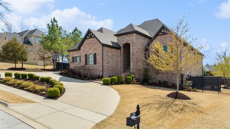 Welcome to luxury living in the gated community of Heritage Hills! With professional design touches, open floor plan and a backyard oasis, this home will leave you wanting for nothing. Walk into a free-flowing layout on the main level where you can host lively game nights with friends & family or cook to your heart's content in the chef's kitchen. When it's time to relax, retreat to your peaceful and private master suite. Downstairs features amazing space for you to entertain including a game room, wet bar and second living area. If outdoors is where you want to be, you can chill at the pool, toast S'mores around the fire pit or watch the big game in front of the fireplace on your covered deck. When you do have to leave your private paradise...you'll find work, shopping and schools are close by with easy access to I-49.  You won't want to be gone for long! Visit www.3075heritagehillsdrivespringdale.com for more information.