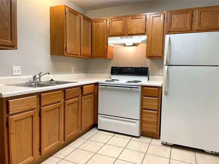 Great Fayetteville apartment located just minutes from shopping, restaurants, walking trail and university. Vinyl plank and tile in main areas. Full-sized refrigerator, electric range and garbage disposal. Stackable washer/dryer. Walk-in closet. Shower/tub combo. Upstairs unit in 6-plex. All electric unit. Tenant pays electric only. Water/trash included in rent. Pets negotiable. $25 application fee per adult, $750 security deposit, $290 non-refundable cleaning fee, $300 pet deposit per pet.