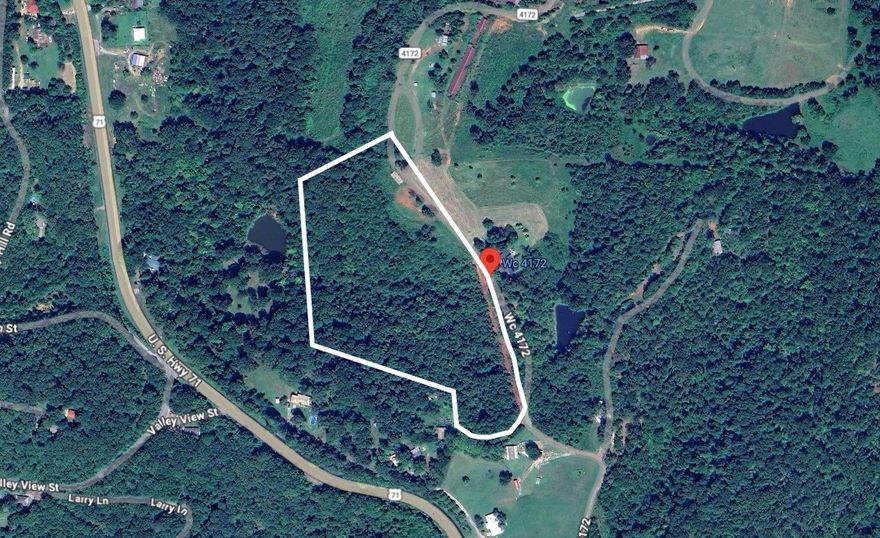 Discover your slice of Northwest Arkansas paradise on this beautiful 11.7-acre tract in Winslow. With over 7 acres of mature hardwoods and rolling topography, this property offers the perfect blend of natural beauty and privacy. Imagine building your dream home surrounded by stunning countryside views while enjoying the peace and elbow room that only rural living can provide. The property features convenient road frontage on a gravel surface road and comes with a survey already completed. Located just off I-49, you'll appreciate the easy commute to Fayetteville and the University of Arkansas, making this an ideal spot for those who want country living without sacrificing accessibility. This mixed-use land in the Greenland School District is ready for your vision. Whether you're planning a custom home, weekend retreat, or investment property, this tract offers endless possibilities in one of Arkansas's most desirable regions.