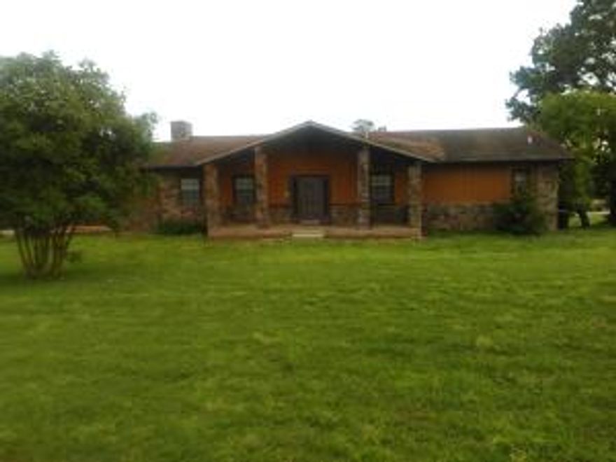 Nice rock and cedar home on 2 acres. 4 bedrooms and 2 1/2 bath, fireplace, basement.  Above the gound pool with nice deck.  Large garden spot with fruit trees.