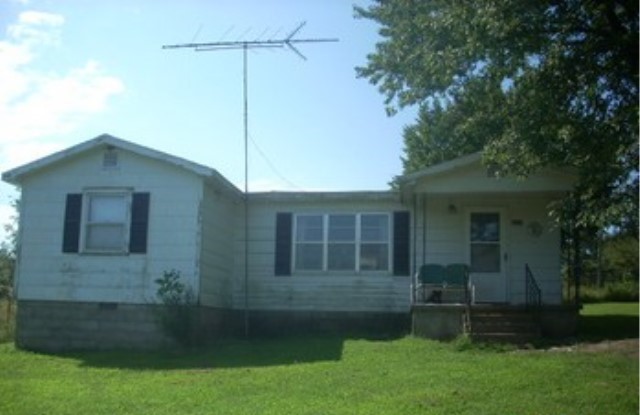 84 acres with 2 homes currently rented