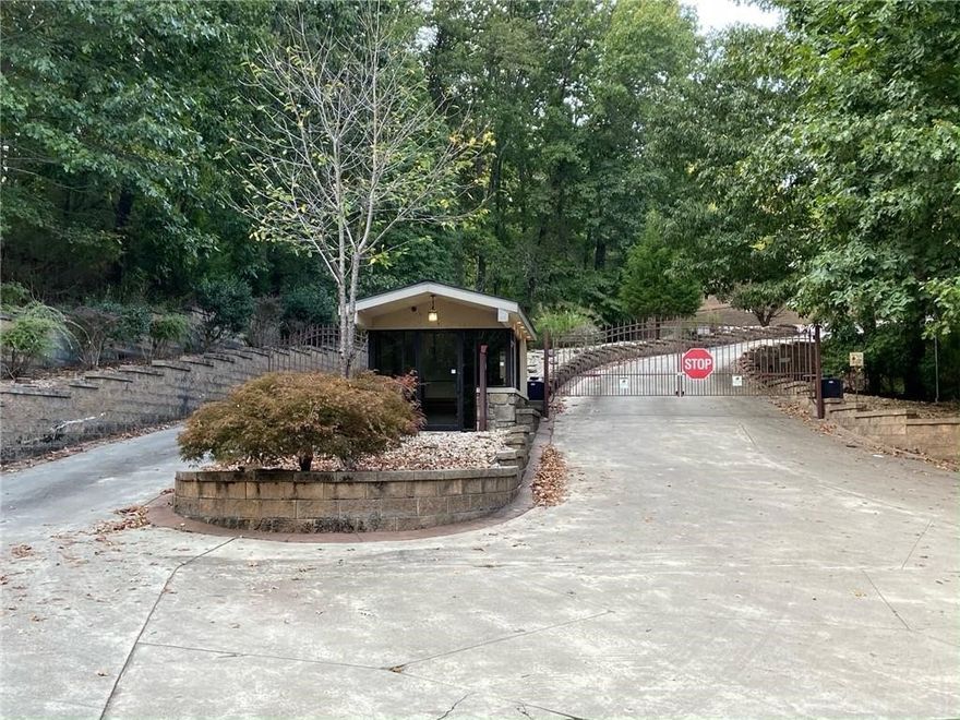 Build your dream home on this spacious lot in a gated subdivision near Beaver Lake. Enjoy the privacy, security, and some lots have a partial view of the lake.