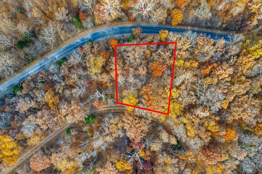 Build your dream home on this beautiful wooded lot in the heart of Bella Vista! Tucked into a peaceful setting near Lake Brittany and Dogwood Golf Course, this property offers privacy, natural beauty, and access to an incredible outdoor lifestyle. Enjoy kayaking, fishing, world-class golf, and miles of scenic hiking and mountain biking trails. Perfect for a full-time residence or getaway retreat in the Ozarks!