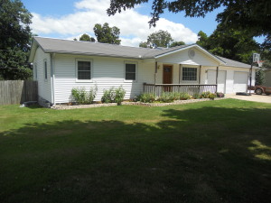 4BR 2BA home on large level lot, home has new windows, laminate flooring, ceramic tile, gas log fireplace, new kitchen, all appliances stay, fenced yard. Has large covered back porch and deck, must see to appreciate.