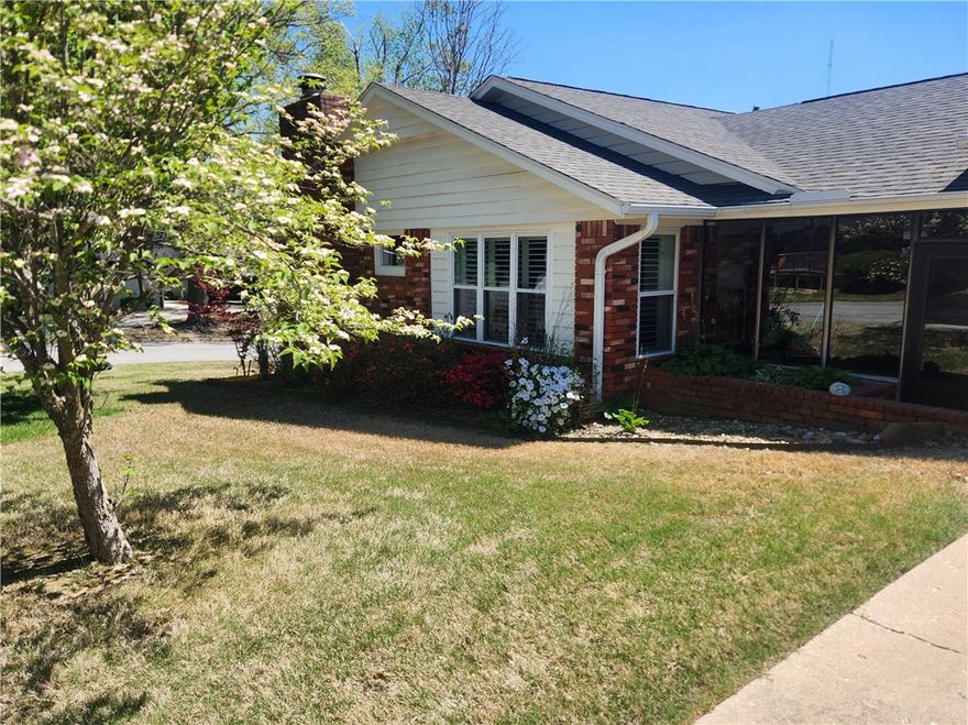 Established neighborhood! An unbeatable location just up the hill from Coler bike park, it's a wonderful place to call home. Minutes from Downtown Bentonville and Crystal Bridges Museum. This 3 bedroom, 2 bath home offers 1815 SF PLUS a 310 SF glassed-in heated glassed-in porch, wood-burning fireplace, and custom wood shutters. Roof replaced in 2024. Owner is an Arkansas licensed real estate broker