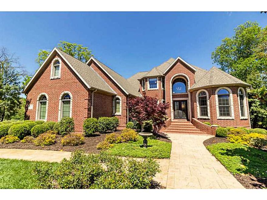 Custom 3 level luxury home w/ exquisite design featuring 5 bed, 5.5 bath w/ over 7361 sqft of meticulously newly renovated living space. Majestic tailored front door leads you into the grand foyer w/stunning curved stairs & elegant marble floors. The,kitchen features ALL NEW NEVER USED gourmet chef style appliances, new cabinets, granite and beautiful new Brazilian hardwood floors. 5 star entertaining on lower level with newly added theater room. Must see the home to believe!