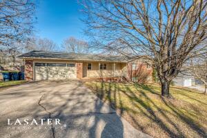 This all brick, 4 bed, 3 bath home featuring a large open living room with a wood fireplace, a lovely kitchen is with abundant cabinetry, plus a separate dining room. Behind the kitchen is the large laundry room. On the main level, you have 3 spacious bedrooms with 2 full baths. The primary suite features double walk-in closets. In the basement, you have two large multipurpose rooms. One is currently used as a den and the other has been used as a bedroom or playroom with a Jack and Jill bathroom in between. You also have a 15 x 52 garage for double parking or all your storage needs. The home is situated on a quiet and private cul de sac, with a fenced in backyard, and large back deck, perfect for your BBQ grills and patio furniture.