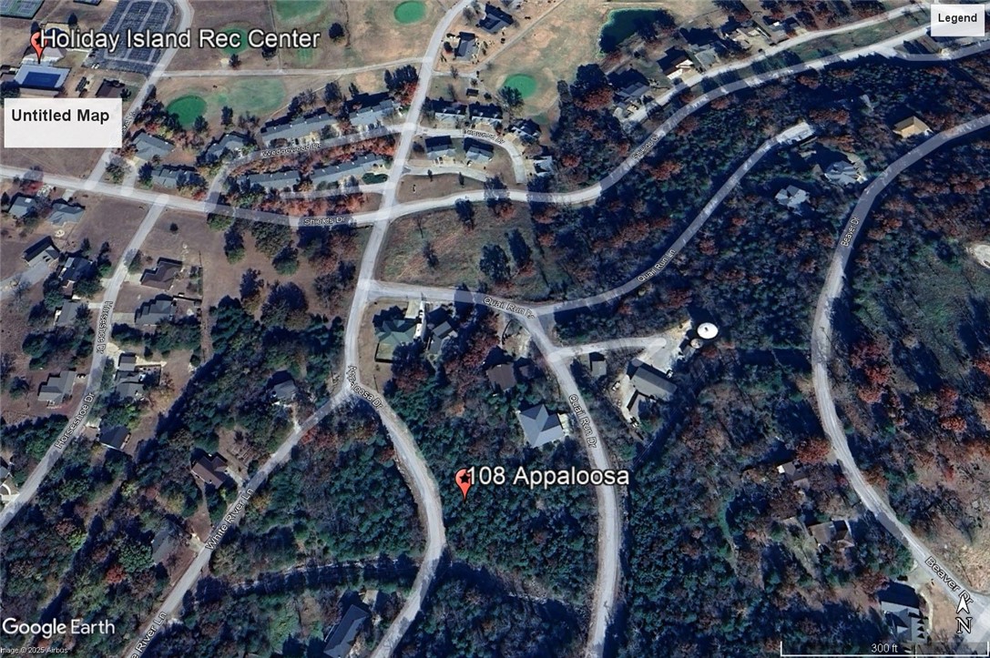 Ready to build your dream home? This lot is walking distance from the Holiday Island Recreation Center and a short walk to the water. Quiet and gently wooded within a neighborhood, this lot offers the best of both worlds. Enjoy the amenities in Holiday Island like golf courses, a country club, swimming, tennis and a marina with a fishing dock or watch the local fauna from your front porch! Nearby Eureka Springs or Rogers offers great shopping and vibrant cultural hubs.