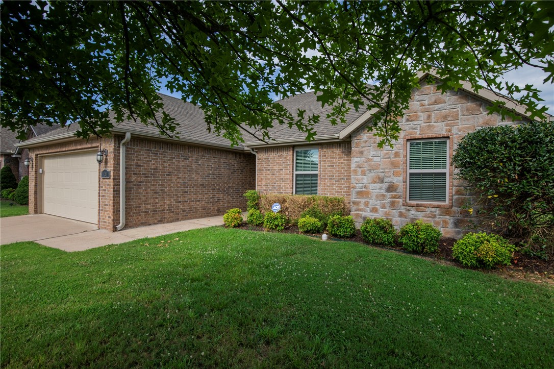 All brick, one level home on a large corner lot wrapped in a privacy fence. This home has been well maintained and is turnkey ready with newly painted walls and recently installed new garage door and opener. Located in a quiet neighborhood with easy access to U of A campus and to hwy 49.